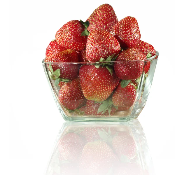 Bowl of strawberries in hand — Stock Photo, Image