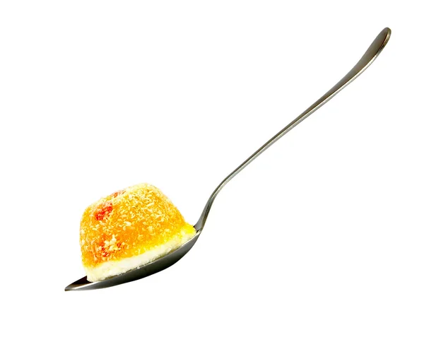 Mermelada sobre una cuchara sobre un fondo blanco —  Fotos de Stock
