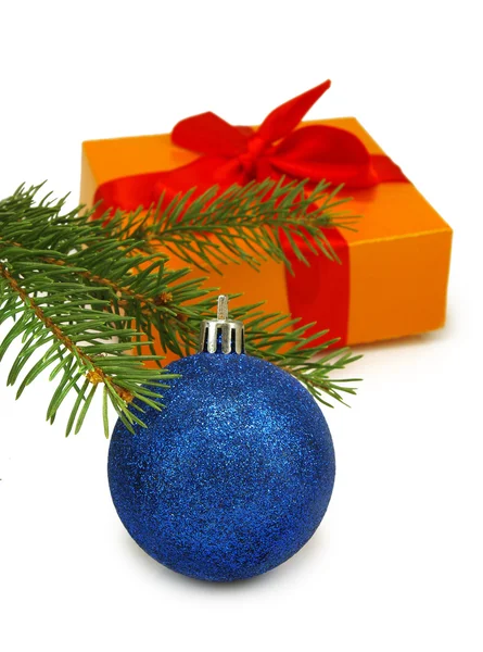 Gift box, fir branches and Christmas blue ball  on white background — Stock Photo, Image