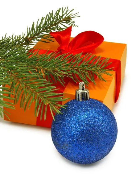 Gift box, fir branches and Christmas blue ball  on white background — Stock Photo, Image
