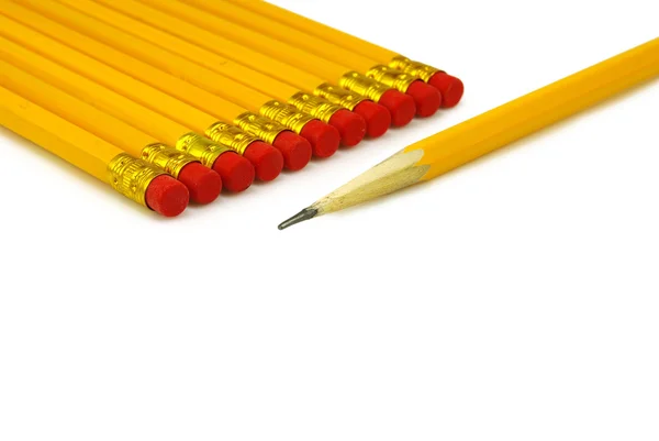 Imagem isolada de muitos lápis sobre fundo branco — Fotografia de Stock