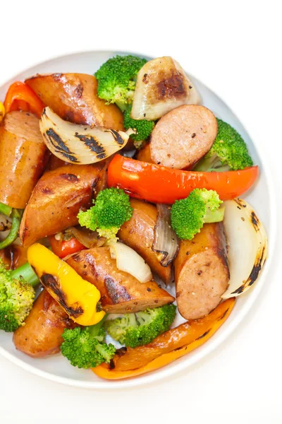 Grilled kielbasa and vegetables — Stok fotoğraf