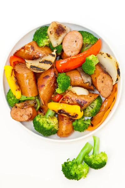 Grilled kielbasa and vegetables — Stock Photo, Image