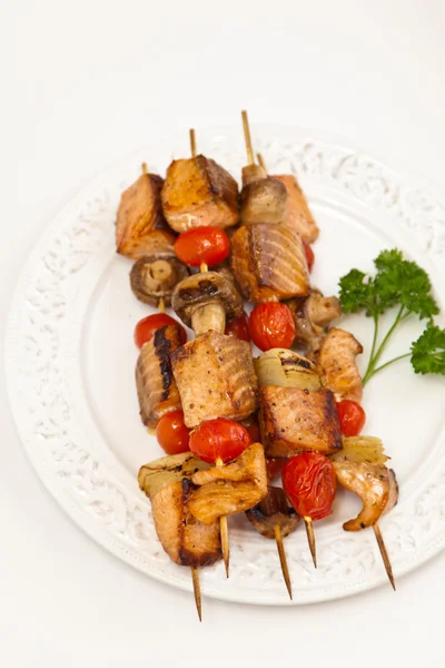 Plate with homemade salmon kebabs — Stock Photo, Image