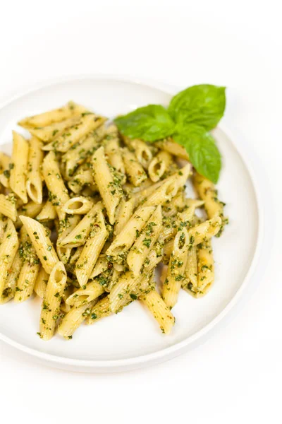 Massa com molho de pesto — Fotografia de Stock