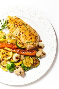 Grilled chicken breast with vegetables clipart