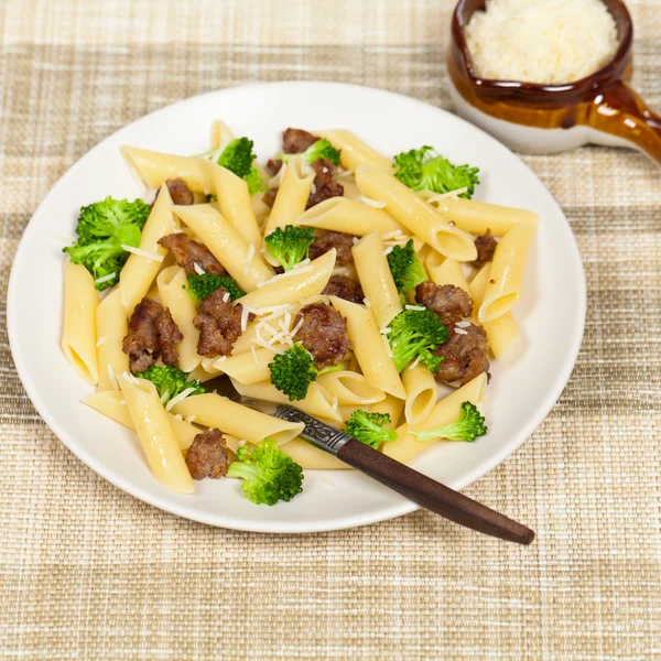 Pasta with sausage and broccoli — Stock Photo, Image