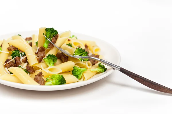 Pasta with sausage and broccoli — Stock Photo, Image