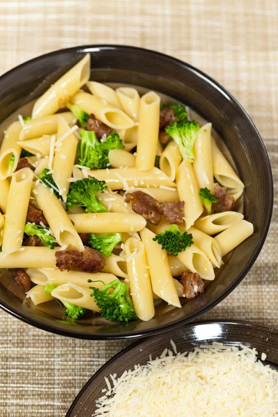 Pasta with sausage and broccoli — Stock Photo, Image