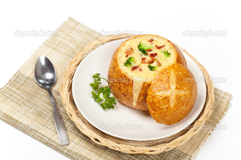 Sourdough bread bowl filled with broccoli cheese soup