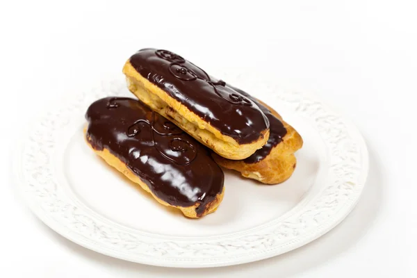 Chocolate eclairs — Stock Photo, Image