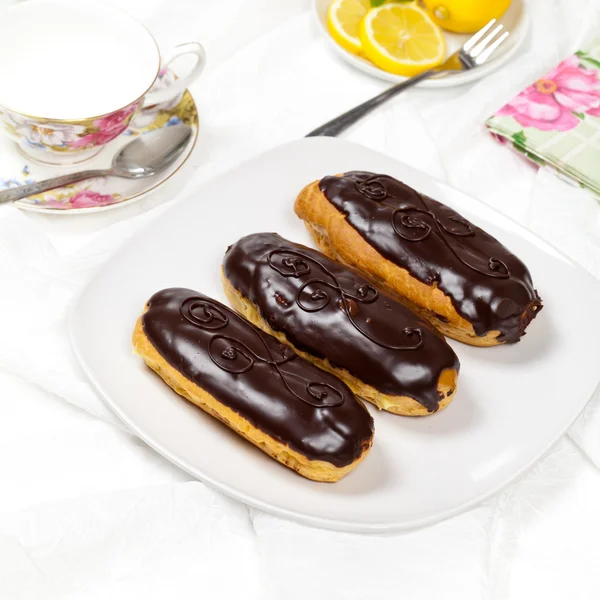 Homemade eclairs with cream — Stock Photo, Image