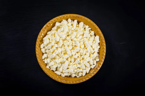 Feta Crumbled Cheese Black Background Copy Space Selective Focus — стоковое фото