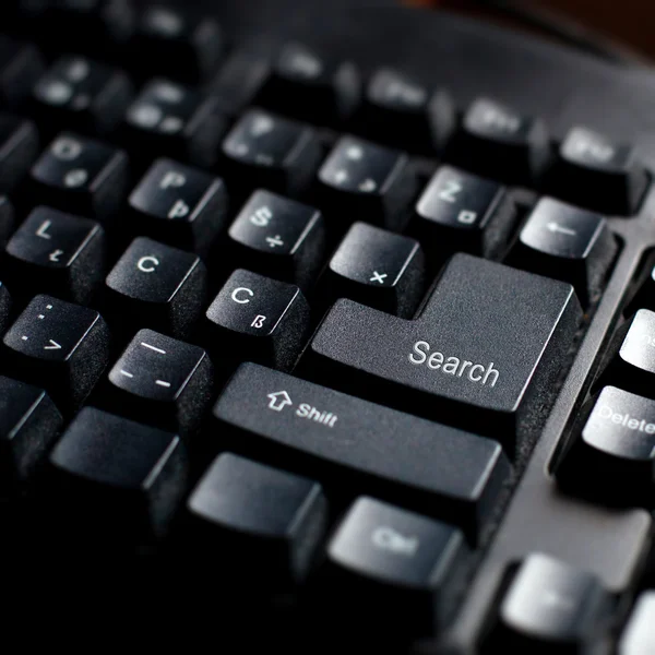 Sinal de pesquisa no teclado do computador — Fotografia de Stock