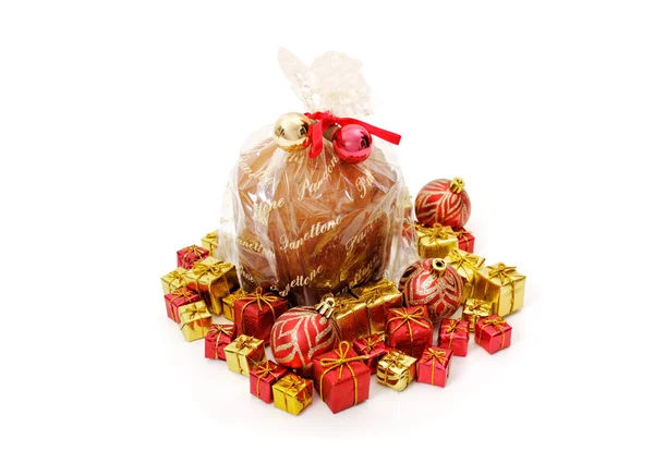 Isolated panettone and ornaments Royalty Free Stock Images