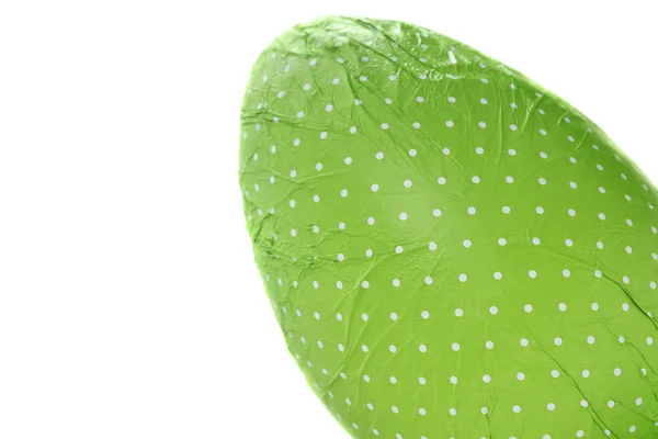 Green wrapped Easter Egg from corner — Stock Photo, Image