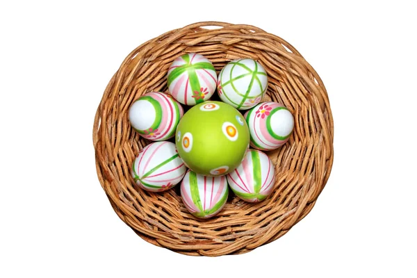 Easter eggs in a basket top view — Stock Photo, Image