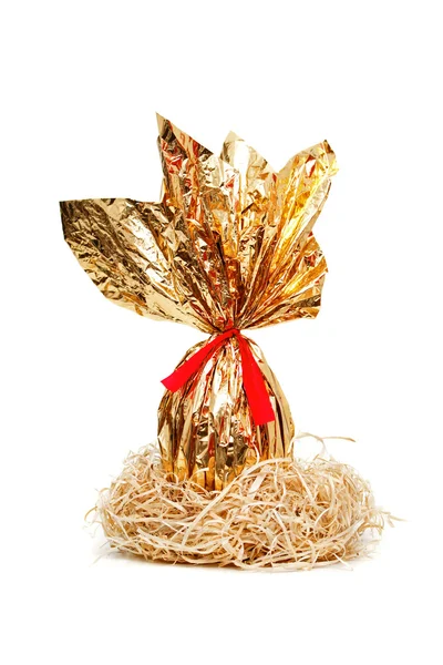 Golden easter egg in a nest — Stock Photo, Image