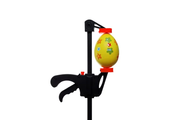 Easter egg and vise grip — Stock Photo, Image
