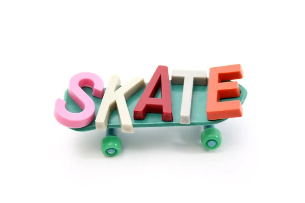 Скейт слово на скейтборді — стокове фото