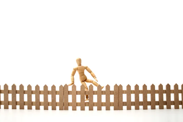 Dummy jumping the fence — Stock Photo, Image