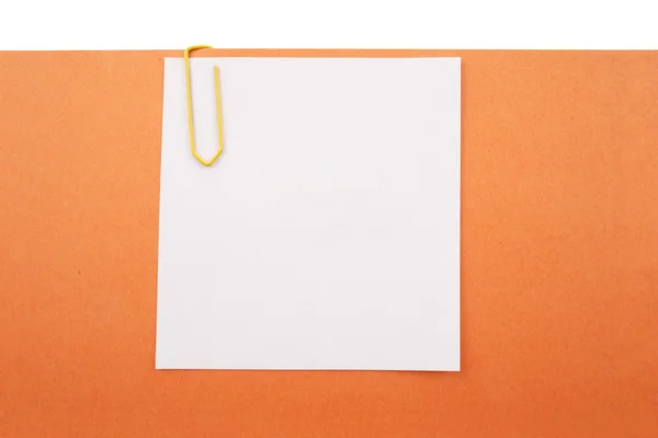 Geknipte bericht op oranje papier — Stockfoto