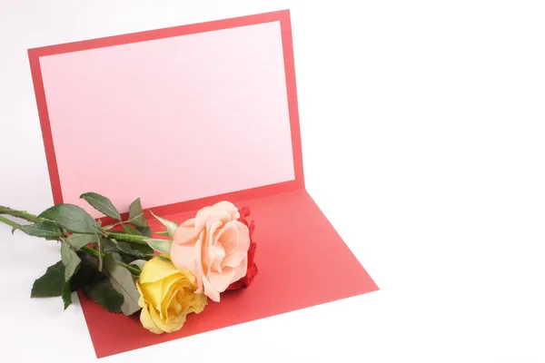 Schöne Grußkarte und Rosen — Stockfoto