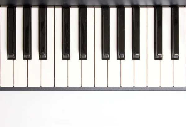 Learning how to play piano — Stock Photo, Image