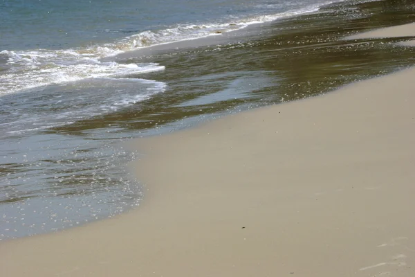 Auf Sand schreiben — Stockfoto