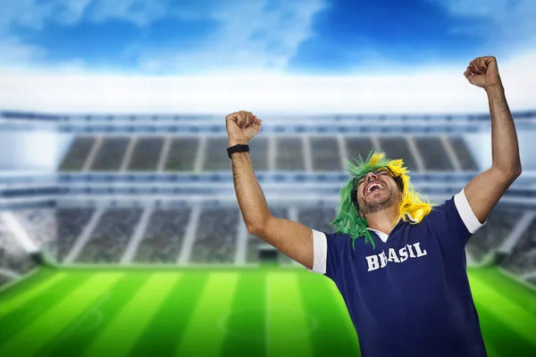 Brazilian fan screaming at stadium — Stock Photo, Image