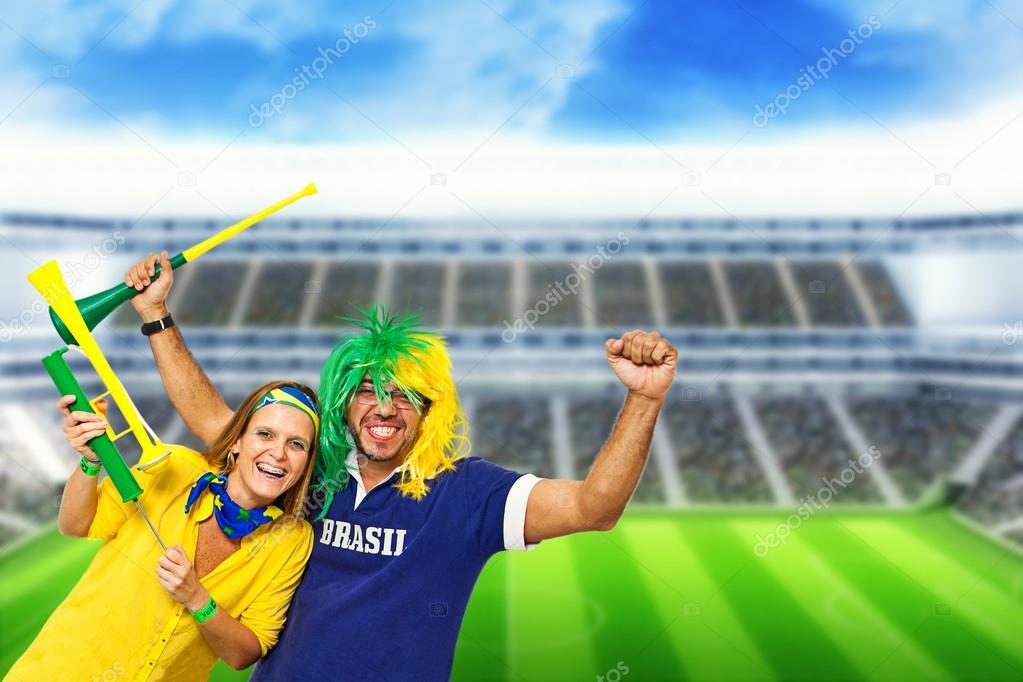 Brazilian couple supporters at stadium