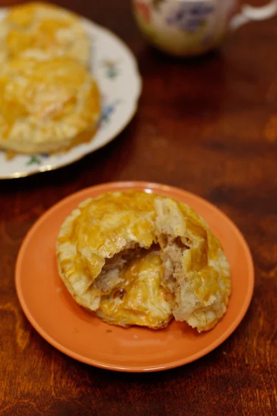 Meat pies with tea — Stock Photo, Image
