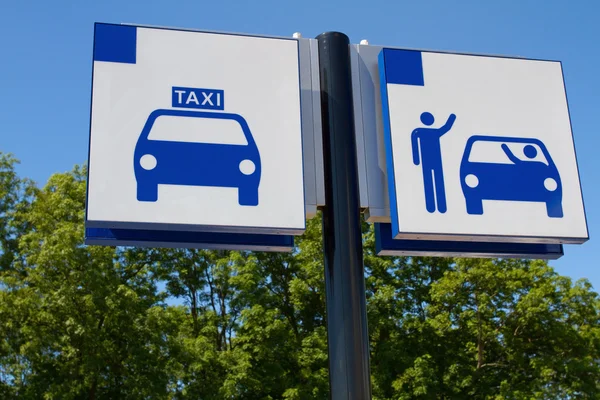 Таксі і вихідний знак Стокова Картинка