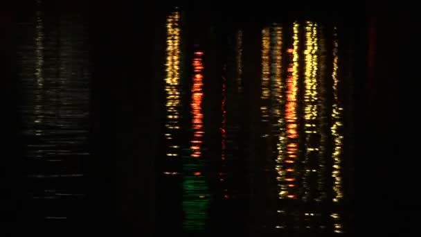 Water surface texture ripple reflection at night — Stock Video