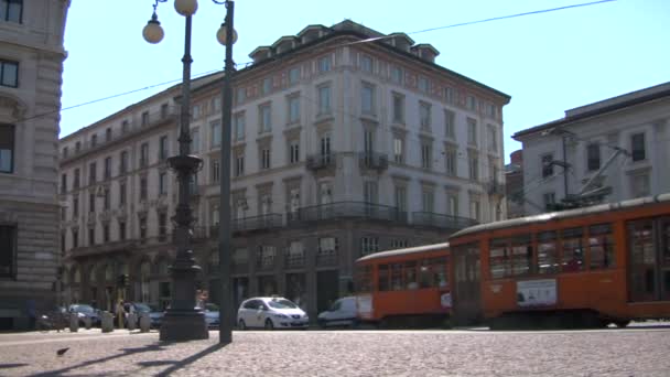 Typical yellow trams in Milan (Italy) — Stock Video