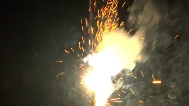 Yellow sparkler on black — Stock Video