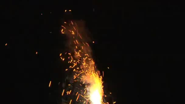 Yellow sparkler on black — Stock Video