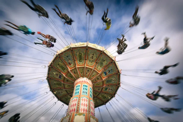 Spinning vintage swing ride — Stock Photo, Image