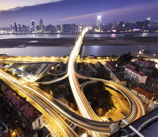 Long exposure photo of city ring road viaduct night scene — Stock Photo, Image