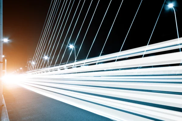 Light trails in Bridge deck — Stock Photo, Image