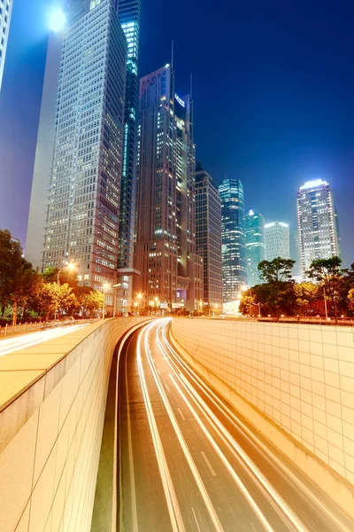 The light trails on the modern building background in shanghai china Stock Image