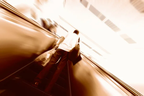 Blue moving escalator in the office hall perspective view — Stock Photo, Image