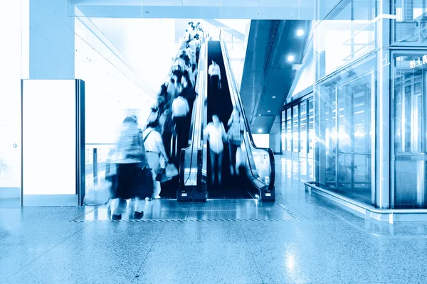 Blue moving escalator in the office hall perspective view — Stock Photo, Image