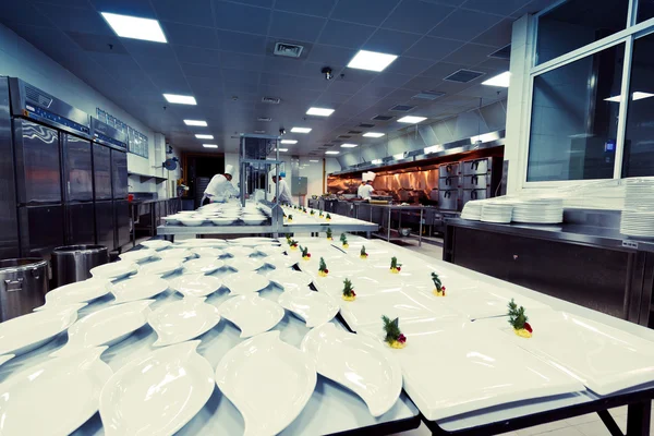 Motion chefs of a restaurant kitchen — Stock Photo, Image