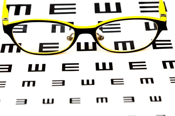 Eyesight test chart on white background close-up — Stock Photo, Image