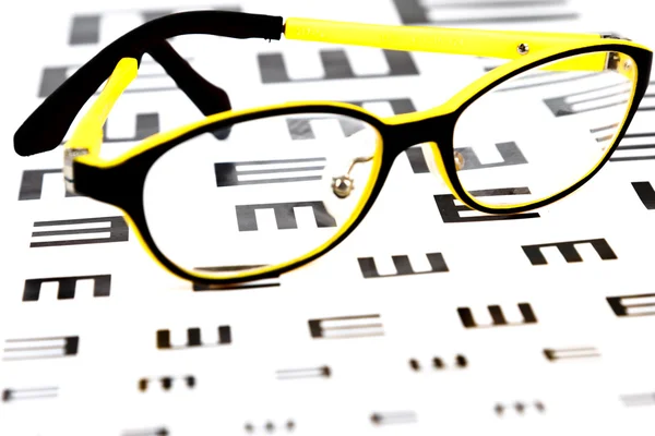 Glasögon på vision testbild — Stockfoto