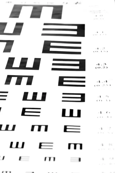 Eyesight test chart on white background close-up — Stock Photo, Image