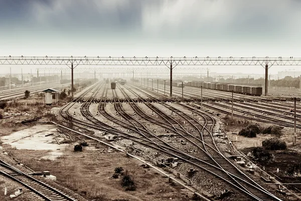 Railway in fog on station, outdoor landscape — Stock Photo, Image