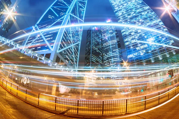 The light trails on the modern building background in shanghai china — Stock Photo, Image