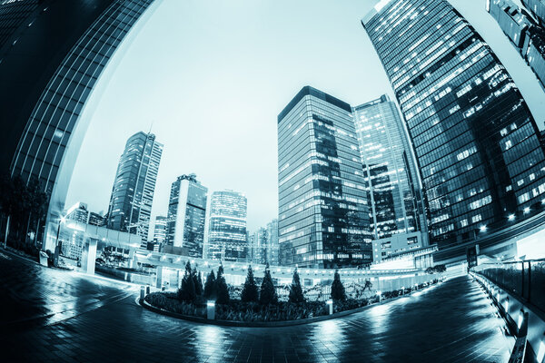 The light trails on the modern building background in hongkong china.